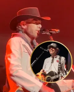 “87 seconds… and America held its breath for Toby Keith.” Standing under those bright award-show lights, Toby Keith didn’t look like a man trying to impress anyone. He looked like someone carrying the weight of a long fight, but refusing to let it dim his fire. When he surprised everyone with “Don’t Let the Old Man In,” the room went still in a way you could almost feel in your chest. And then he said it — softly, steady, almost like a prayer: “I will try to be a friend to God and finish every day.” People didn’t just clap. They stood. They cried. They knew they were watching a goodbye wrapped in courage. Toby didn’t ask for sympathy. He just showed heart — the kind that stays with you long after the lights fade. Featured image