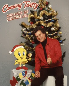 32 YEARS GONE… AND HIS VOICE STILL STEALS CHRISTMAS.Conway Twitty’s been gone 32 years, but the moment this unreleased 1980s cut of “Ding-A-Ling The Christmas Bell” starts, it feels like he just walked back into the room. His voice slips in warm and slow, like whiskey touching cold glass — playful, teasing, almost sinful in the sweetest way. There’s a grin hiding in every note, the kind that makes Christmas lights glow a little lower. And somehow… every “ding-a-ling” feels like him flirting with the world one more time, reminding us that some voices don’t disappear. They just wait for December to come back around. Featured image
