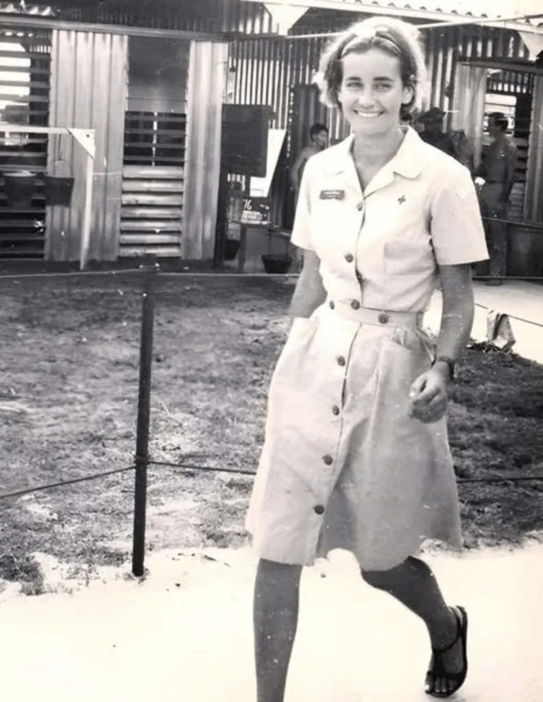 The Donut Dollies of Vietnam: Unsung Heroines of Morale During the Vietnam War, from 1962 to 1973, 627 young American women answered a call to serve—not with weapons, but with courage, compassion, and resilience. They were the Red Cross Supplemental Recreational Activities Overseas (SRAO) volunteers, affectionately known as the “Donut Dollies.” These women, typically between the ages of 21 and 24, were college graduates who left behind the safety of home to step into a war zone. Unlike their World War II and Korean War predecessors, who became famous for handing out donuts and coffee to weary troops, the Vietnam Donut Dollies carried no baked goods. In the stifling heat of Southeast Asia, donuts would have spoiled instantly. Instead, they brought something more enduring: a reminder of home through conversation, laughter, games, and simple human connection. Their mission was to lift spirits in the most difficult of circumstances. Traveling over 2 million miles by jeep, truck, and helicopter, the Donut Dollies reached soldiers stationed at firebases and bases stretching from An Khe to Cu Chi. Dressed in their light-blue uniforms, they brought programs and recreational activities designed to ease the crushing stress of combat. In hospitals, they sat at the bedsides of the wounded, offering companionship in moments when hope was thin. But their service was not without risk. The Donut Dollies lived with many of the same dangers as the soldiers they supported. Mortar attacks, sniper fire, and sudden ambushes were part of daily life. Three volunteers paid the ultimate price: one lost to illness, one killed in a jeep accident, and one brutally murdered in 1970. For those who survived, the war left deep marks—memories of young soldiers they comforted one day who were gone the next, or of close brushes with death in the jungles of Vietnam. The selection process for becoming a Donut Dollie was rigorous. Applicants needed a college degree, letters of recommendation, and what the Red Cross called an “outstanding personality.” It was a role that required energy, adaptability, and emotional strength. The women who qualified often described their motivation as a blend of duty, patriotism, and a desire for adventure. Some, like Joann Puffer Kotcher, who served from 1965 to 1967, survived harrowing moments, narrowly escaping death multiple times. Others, like Penni Evans, found the return home even more difficult than their time in Vietnam. Many grappled with post-traumatic stress long before the condition was recognized, and unlike male veterans, they had little access to benefits or acknowledgment. Some were exposed to Agent Orange but were excluded from compensation and medical support, their contributions largely overlooked for decades. Yet, the impact of their work cannot be overstated. Soldiers often recalled the Donut Dollies as a lifeline in moments of despair. To them, these women were not strangers in blue dresses but reminders of sisters, friends, or sweethearts back home. In the midst of a controversial and divisive war, they represented care without judgment, humanity in the face of brutality. Names like Jeanne “Sam” Christie and Kit Sparrow Cotton are among those remembered for their service, part of a generation of women who gave their youth to a cause few fully understood. Their legacies endure not only in the memories of the men they uplifted but also in ongoing efforts to honor them properly. In recent years, veterans and advocates have pushed for the Donut Dollies to receive the Congressional Gold Medal, one of the nation’s highest civilian honors, recognizing their bravery and sacrifice. The Donut Dollies did not carry rifles or wear combat boots, but they faced war with the same courage as those who did. Their work was measured not in victories on the battlefield, but in moments of relief, laughter, and hope given to young men far from home. In the story of Vietnam, their service is a reminder that sometimes the greatest weapon against despair is a simple smile and the unwavering presence of someone who cares.