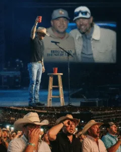 THE MIC WAS EMPTY — AND 50,000 PEOPLE KNEW WHY. Jason Aldean walked onstage and didn’t touch his guitar. Center stage stood a lone mic. A red solo cup rested on a stool beside it. The opening chords of “Should’ve Been a Cowboy” began to play, but nobody sang. The crowd was confused for a heartbeat. Then, they understood. 50,000 people started singing. They took the verse. They took the chorus. They sang for the man who couldn’t be there. Jason didn’t sing a note. He just lifted that cup towards the sky. In the VIP section, grown men in cowboy hats were openly weeping. It wasn’t a concert anymore. It was a family reunion missing its loudest brother. That night, Nashville didn’t just hear the music. They felt the loss.